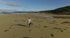 Lizzie Stokely on Cloudy Bay beach